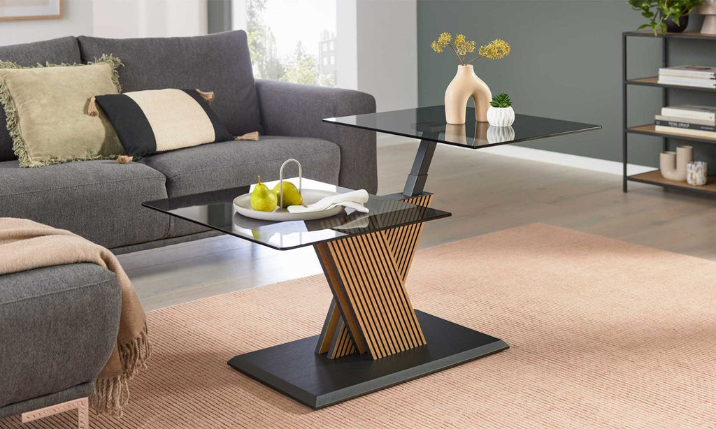 Couchtisch mit schwenkbaren Glasplatten