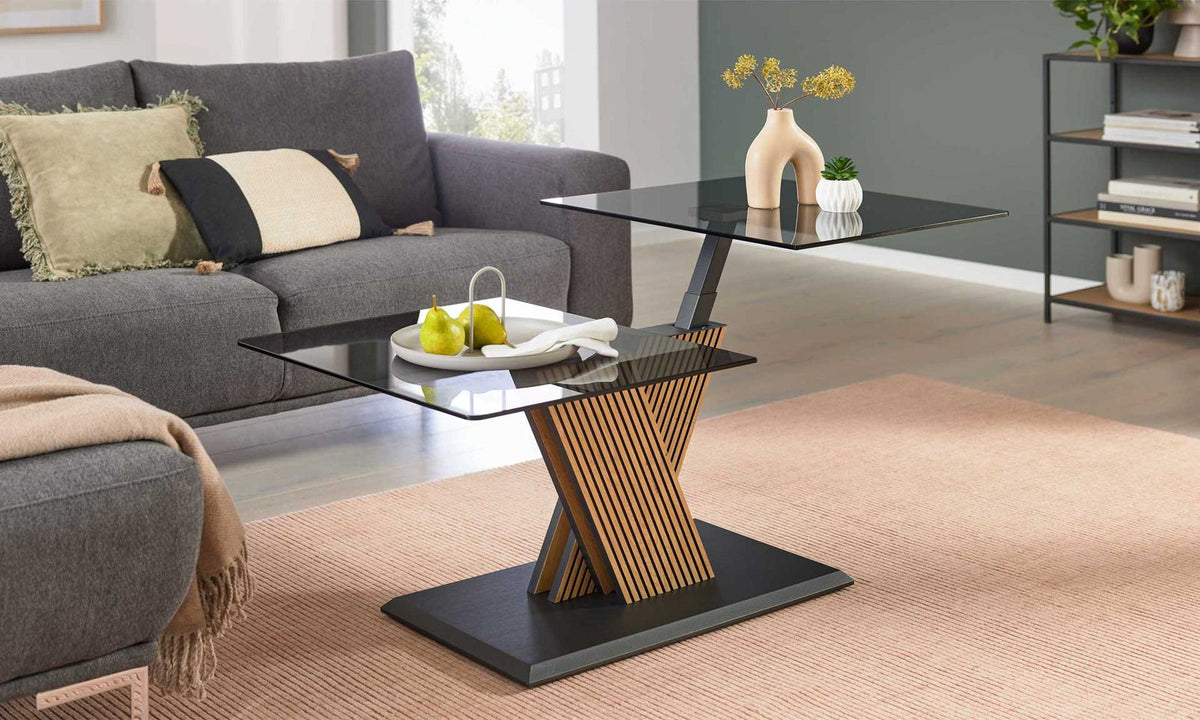 Couchtisch mit schwenkbaren Glasplatten