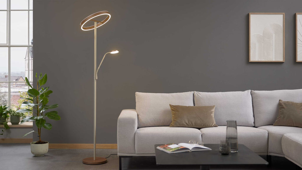 Moderner beigefarbener LED-Fluter in Ringform mit flexiblem Lesearm
