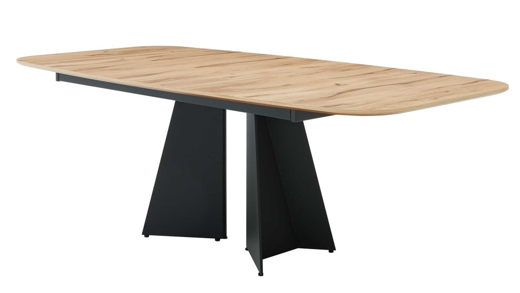 Moderner Esstisch mit abgerundeter Holzplatte und schwarzem Design-Untergestell