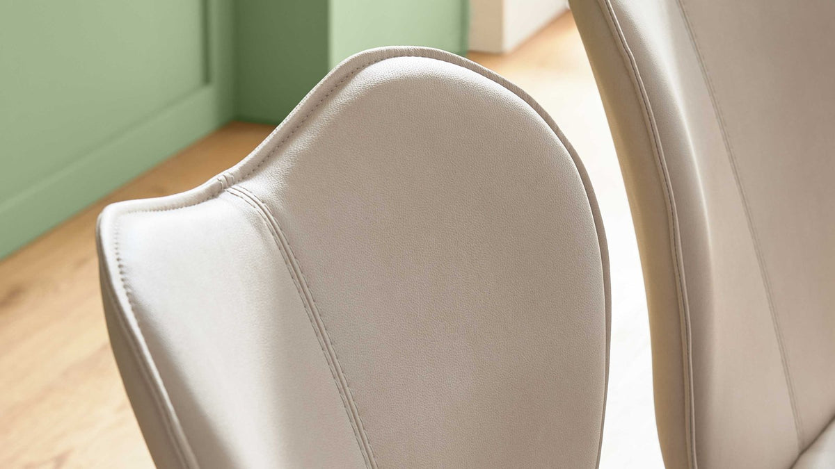 Polsterstuhl mit beige meliertem Stoff und anthrazitfarbenem Metallgestell für moderne Essbereiche