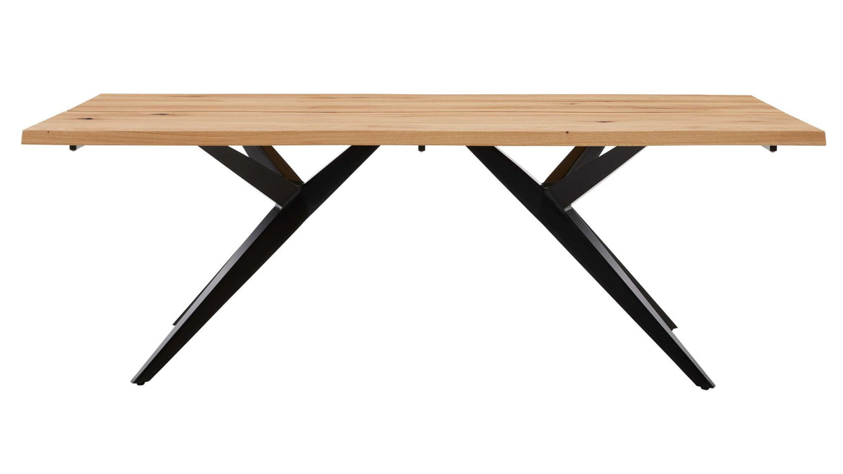Esstisch mit massiver Holzplatte und schwarzem Metallgestell im Kreuzdesign